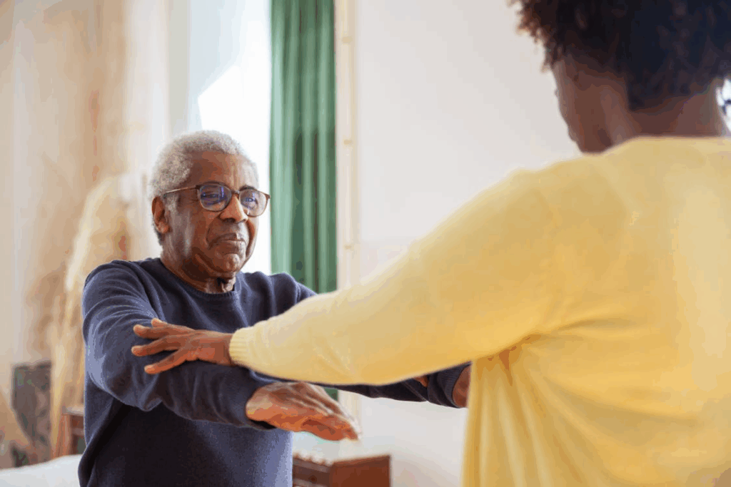 Caregiver assisting senior with balance exercise as part of home care aid in Bergen County