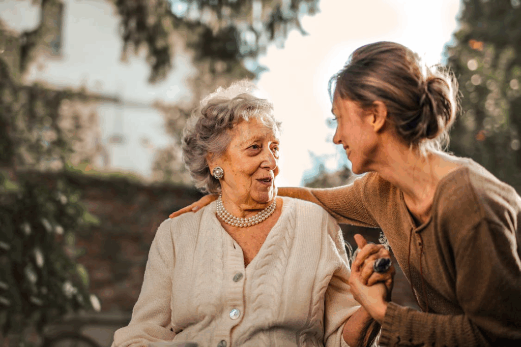 A woman providing senior care assistance at home in Demarest.