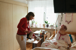 An old woman is back home after surgery to recover